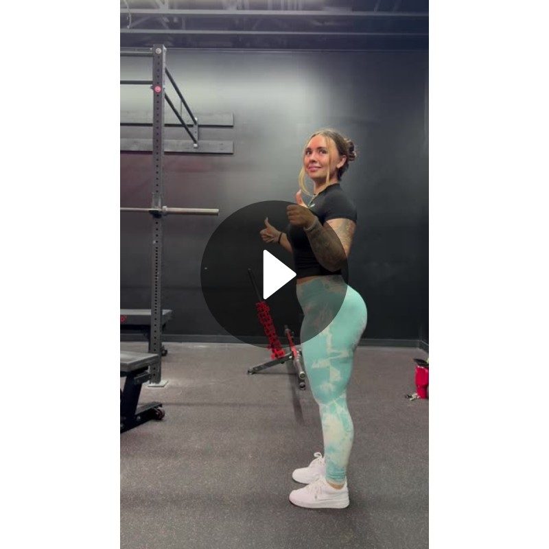Fitness Model Demonstrating Squat Exercise At Gym Abby Berner fitness-model-demonstrating-squat-exercise-at-gym-abby-berner